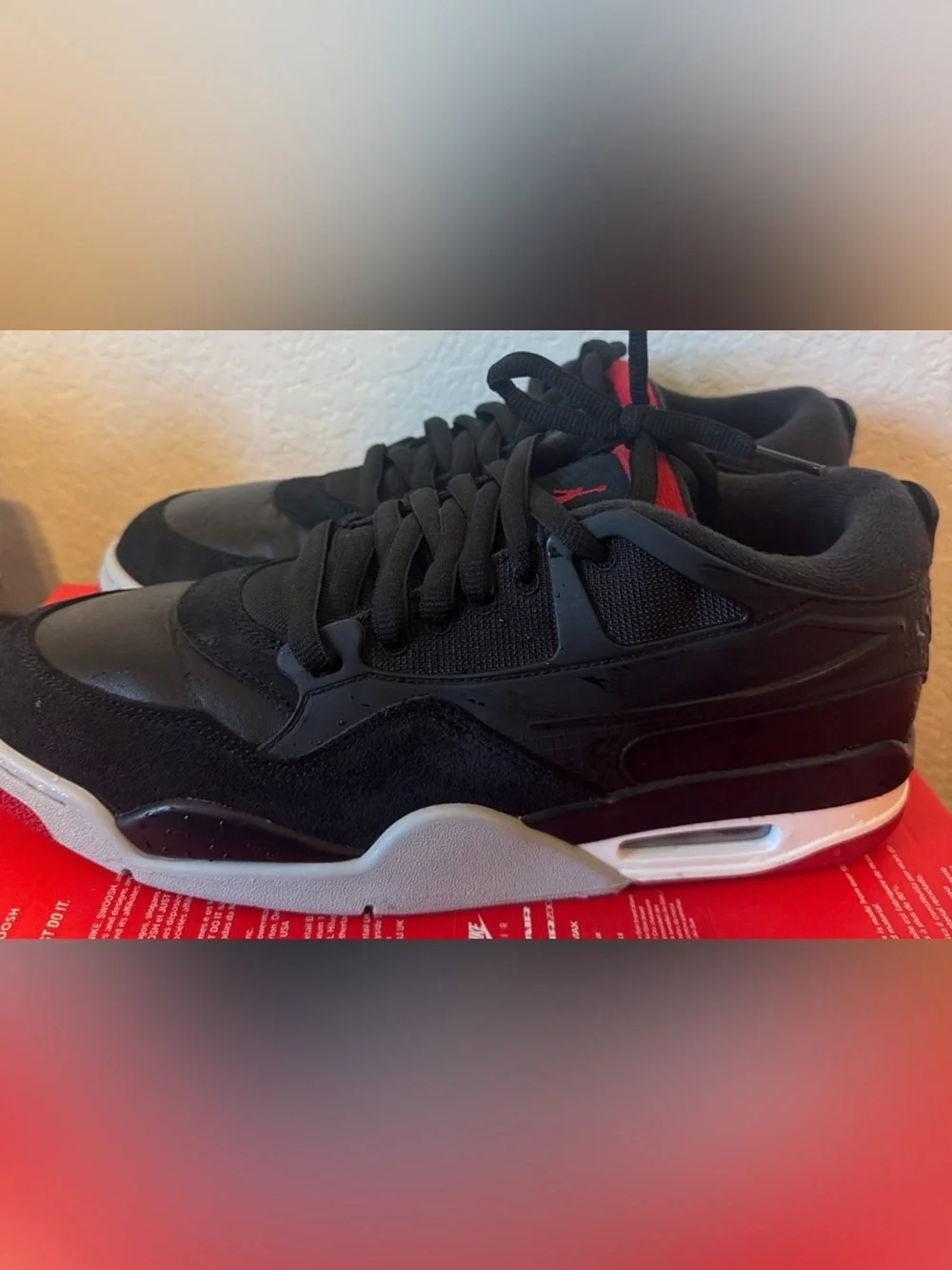 Jordan 4 RM Bred Men’s Black and Red Low-Top Sneakers